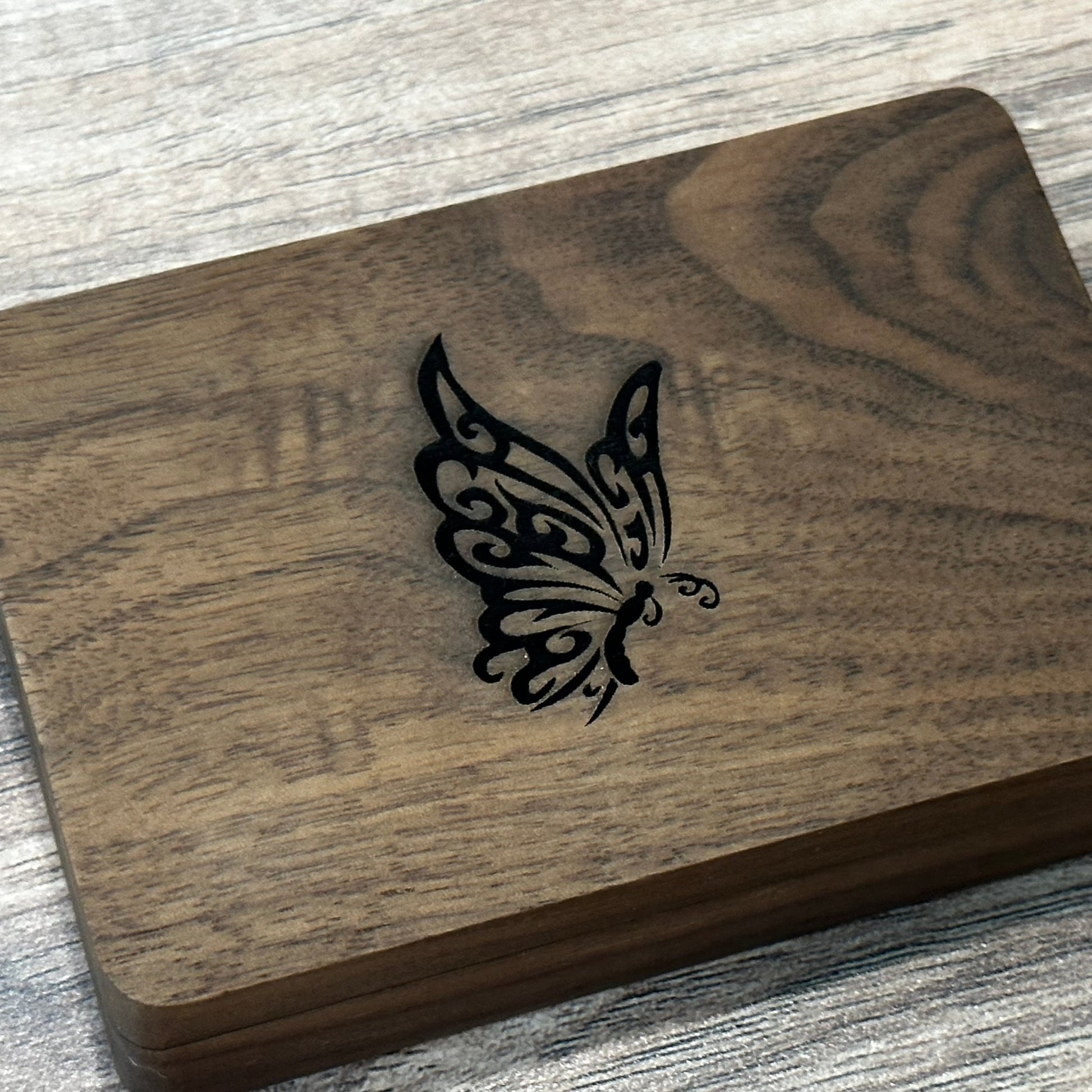 Custom wooden one hitters and stash cigarette case.