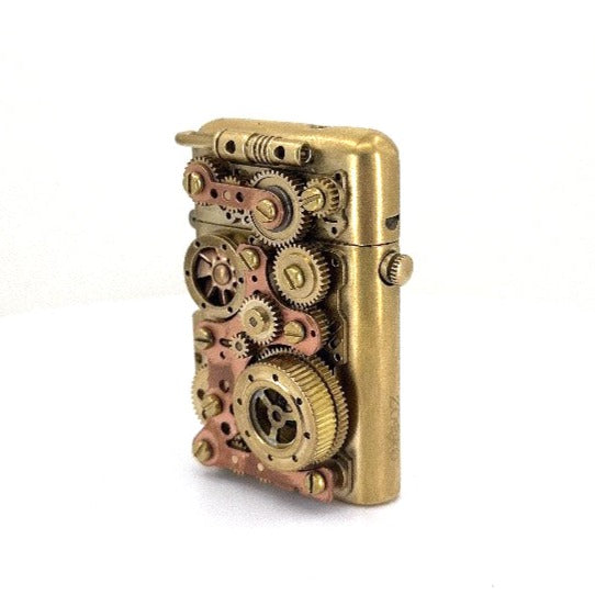 Vintage kerosene brass lighter with auto lighting feature.