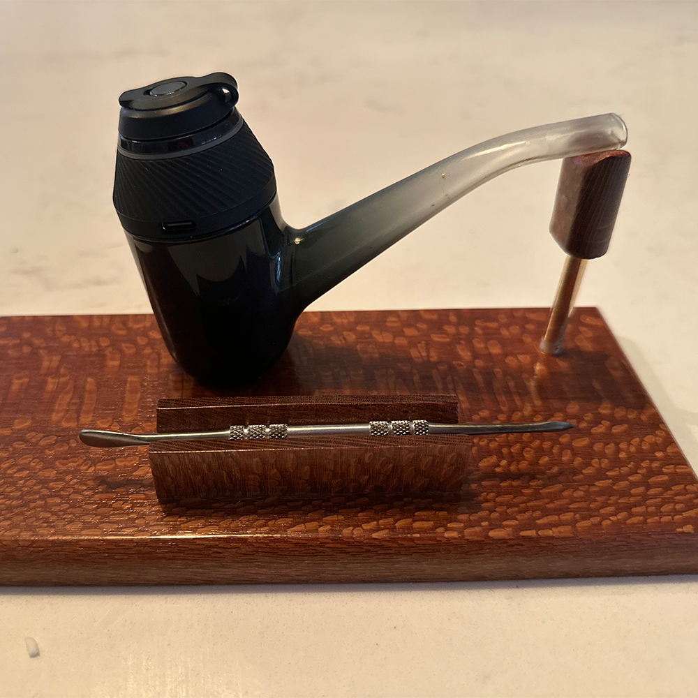 A handmade dab holder stand tool.