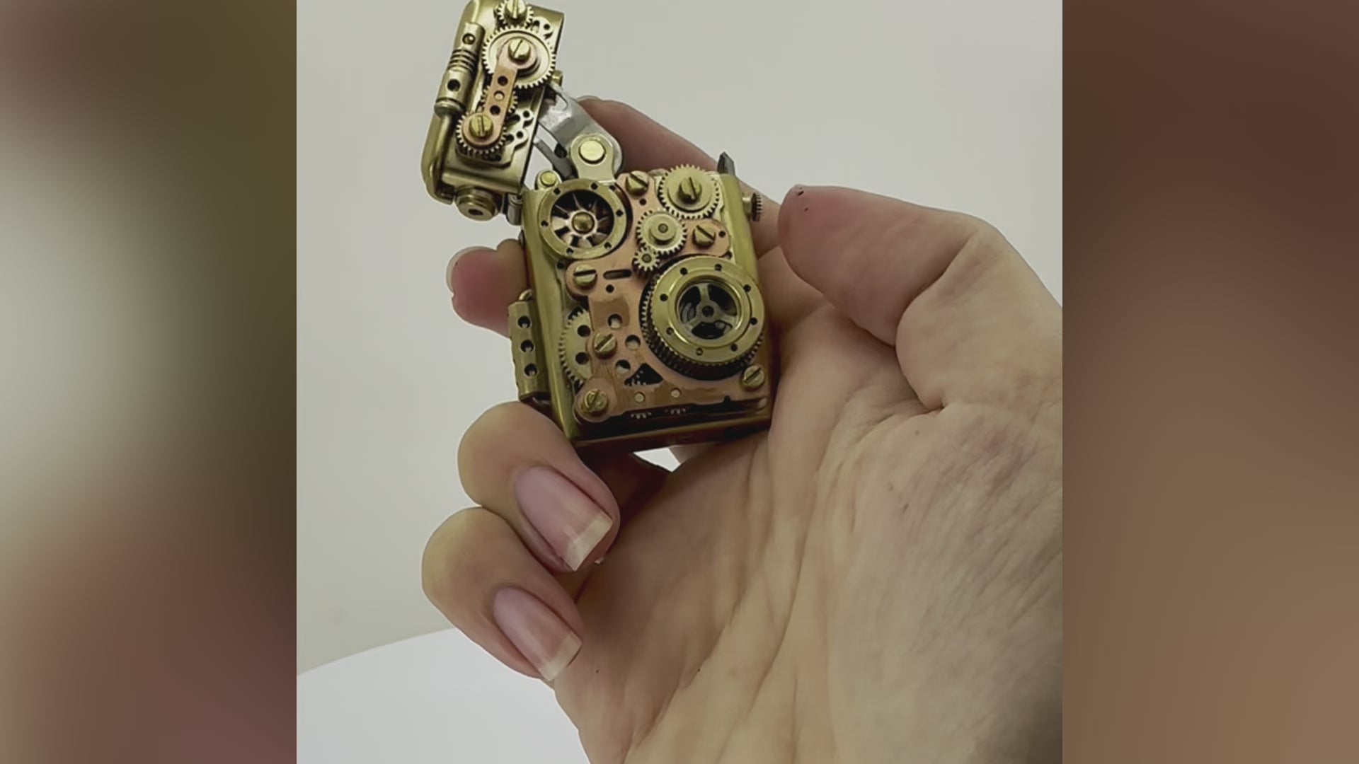 Vintage kerosene brass lighter with auto lighting feature and gears.