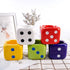 White, red, yellow, green and blue dice ashtray.